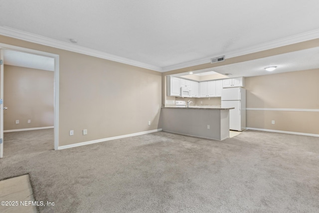 unfurnished living room with light carpet, crown molding, and visible vents