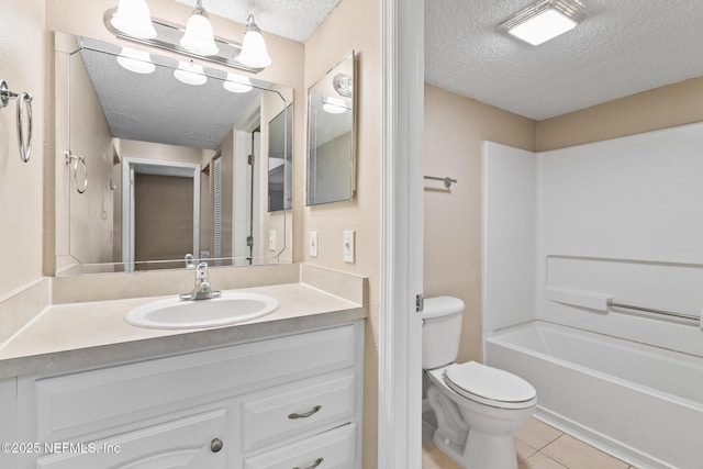 full bathroom featuring a textured ceiling, toilet, a notable chandelier, vanity, and tile patterned floors