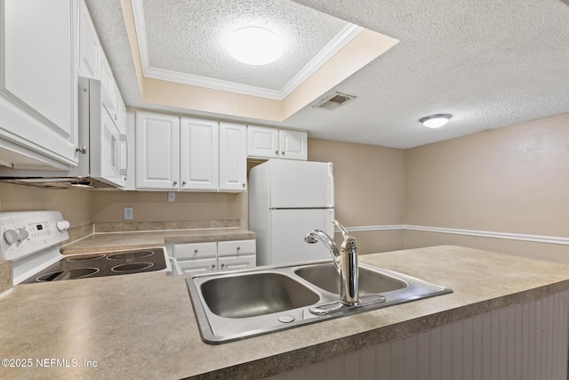 kitchen featuring a textured ceiling, white appliances, a sink, visible vents, and white cabinetry