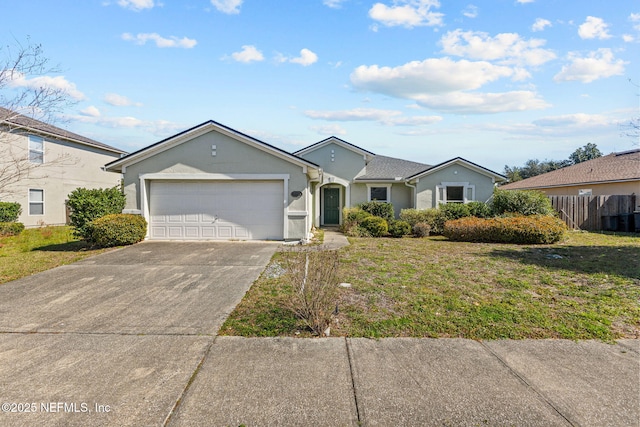 ranch-style home with an attached garage, driveway, fence, and stucco siding