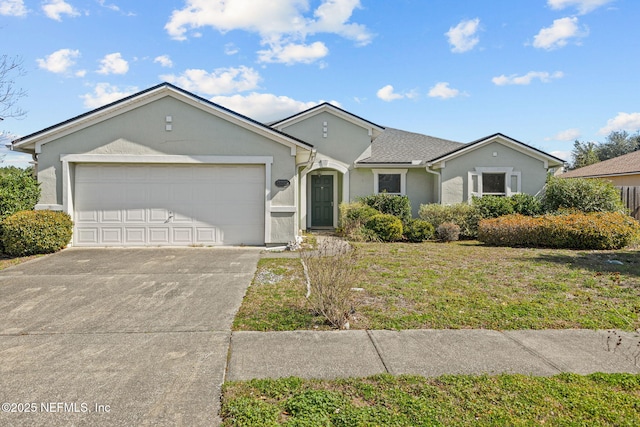 ranch-style home featuring an attached garage, a front lawn, concrete driveway, and stucco siding