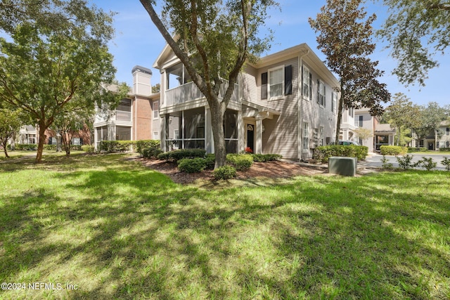 exterior space with a lawn