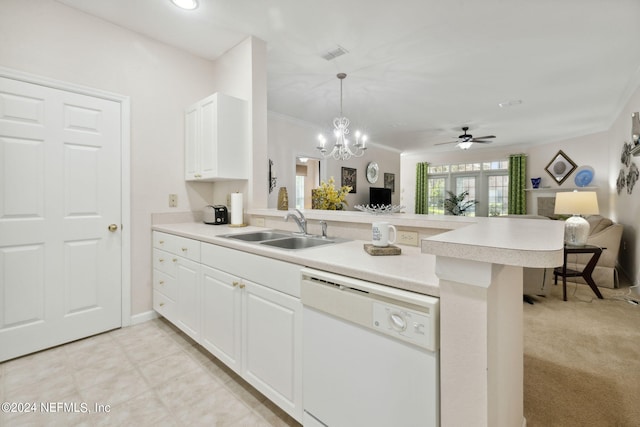 kitchen with white dishwasher, a peninsula, a sink, open floor plan, and light countertops