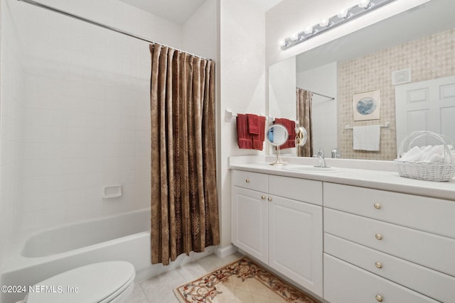 full bath featuring shower / tub combo, vanity, toilet, and tile patterned floors