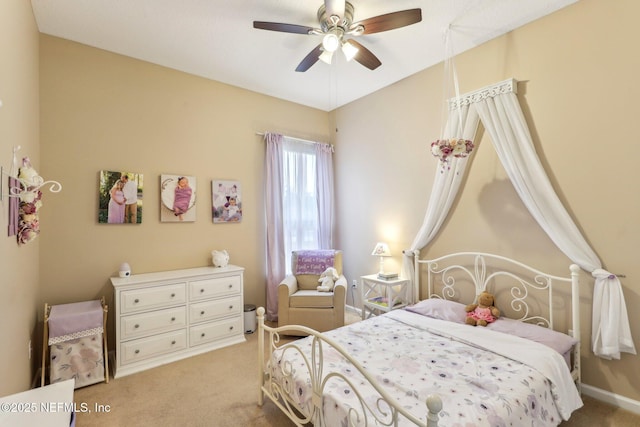 bedroom with light colored carpet and ceiling fan