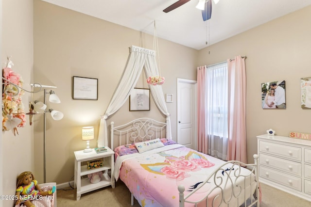 bedroom with light carpet and ceiling fan