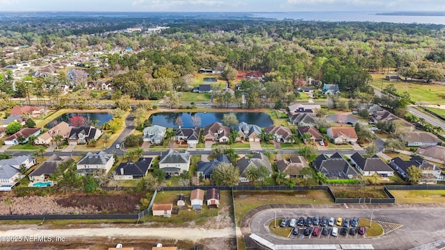 bird's eye view with a residential view and a water view