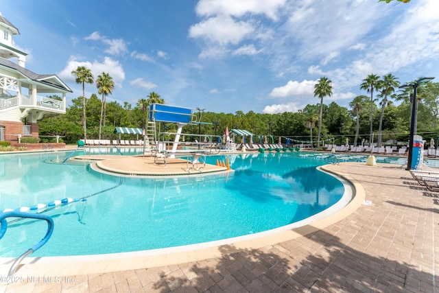 community pool with a patio