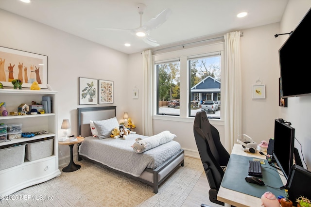 bedroom featuring light wood-type flooring, ceiling fan, baseboards, and recessed lighting