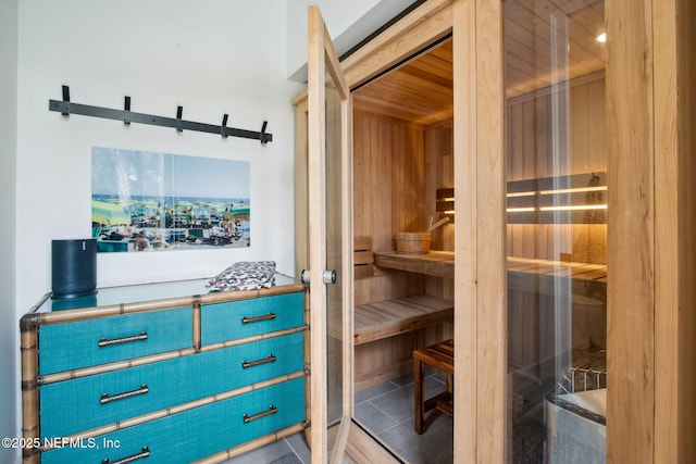 view of sauna / steam room with tile patterned floors