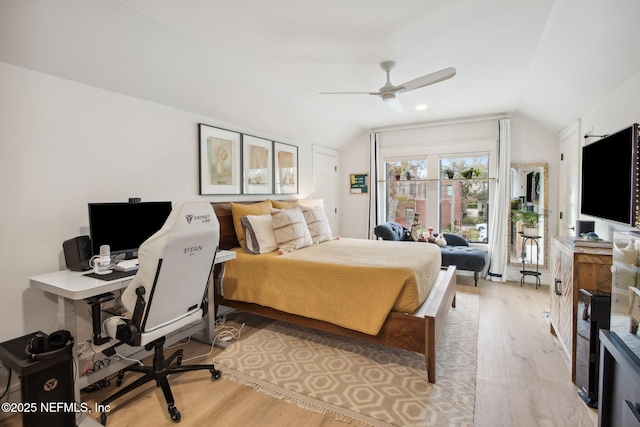 bedroom featuring lofted ceiling, access to exterior, light wood-type flooring, and a ceiling fan