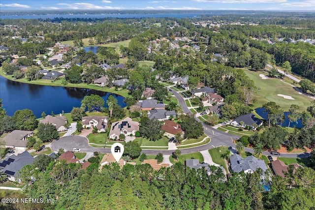 bird's eye view with a water view and a residential view