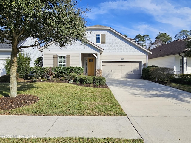 view of front facade featuring stone siding, an attached garage, concrete driveway, and a front lawn