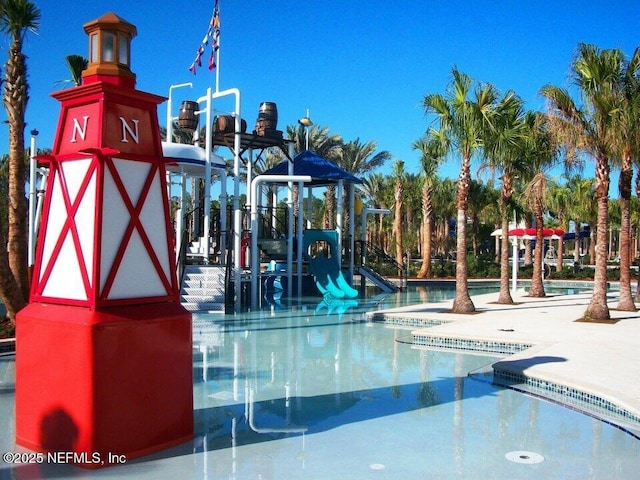 community jungle gym with a water play area