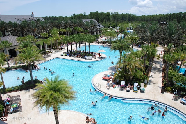 community pool with a patio