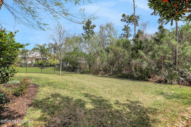 view of yard with fence