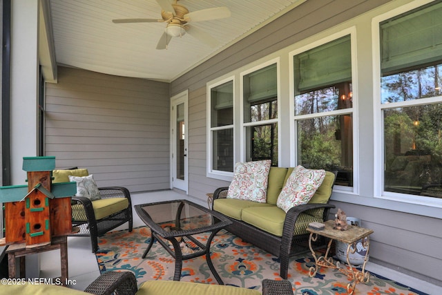 view of patio featuring an outdoor hangout area and ceiling fan