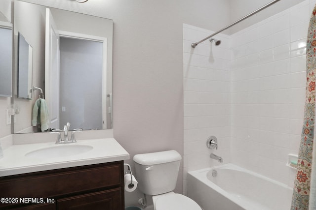 full bath with vanity, toilet, and shower / tub combo with curtain