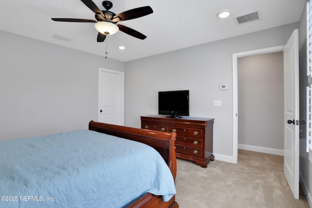 bedroom featuring visible vents, light carpet, a ceiling fan, recessed lighting, and baseboards