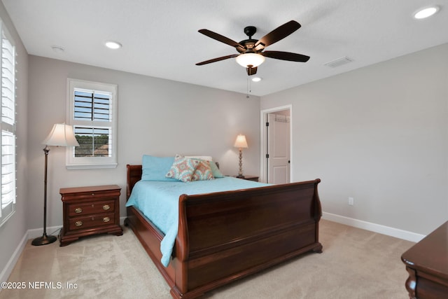 bedroom featuring recessed lighting, visible vents, light colored carpet, and baseboards