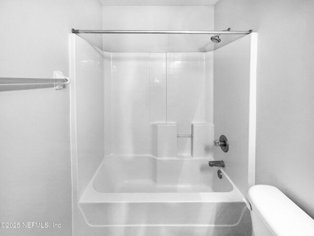 full bath with tub / shower combination and toilet