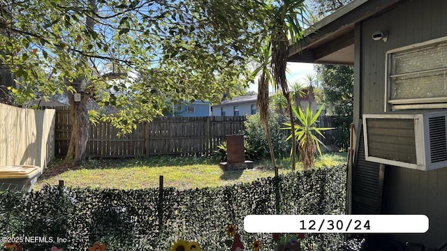 view of yard with fence