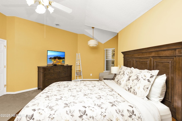 bedroom featuring carpet floors, visible vents, a ceiling fan, vaulted ceiling, and baseboards