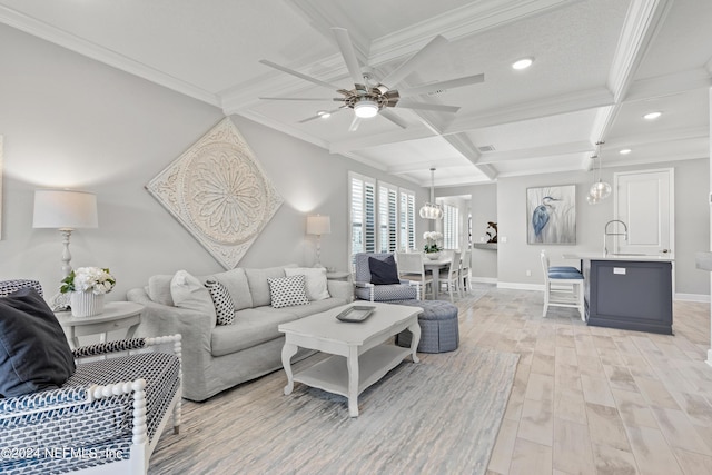 living room with light wood-type flooring, coffered ceiling, crown molding, and beamed ceiling