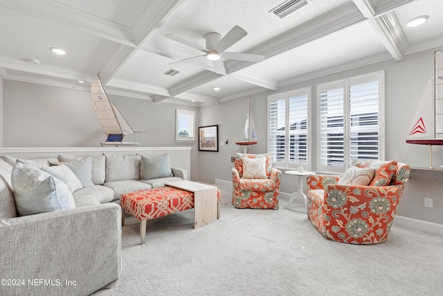 living area with carpet floors, beamed ceiling, coffered ceiling, and visible vents