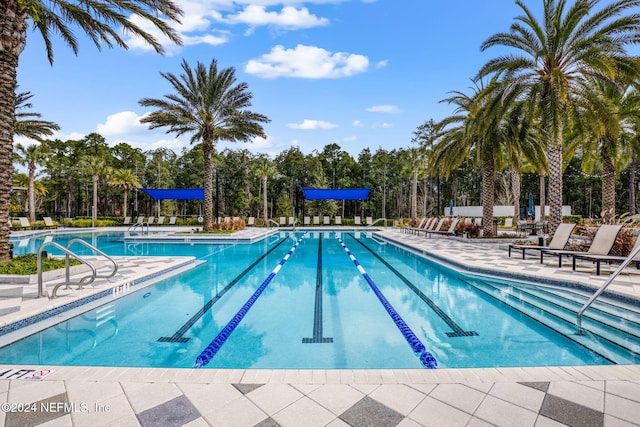 community pool with a patio