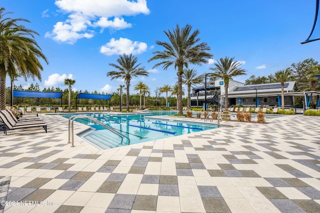 pool with a patio