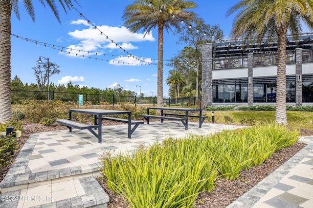 surrounding community featuring fence