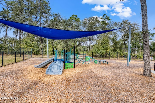 community play area featuring fence