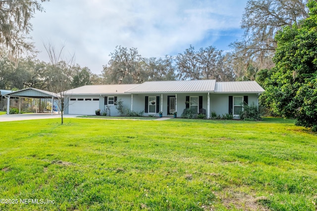 single story home featuring a porch, an attached garage, metal roof, driveway, and a front lawn