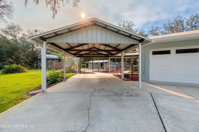 view of parking / parking lot featuring driveway and a detached carport