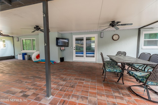 view of patio / terrace featuring outdoor dining area and a ceiling fan