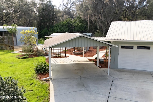 exterior space featuring a carport and concrete driveway