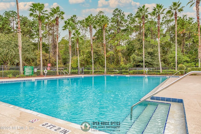 pool featuring fence