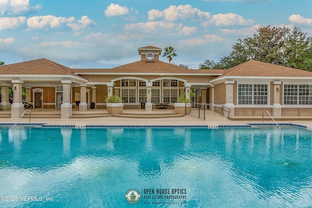 pool with a patio