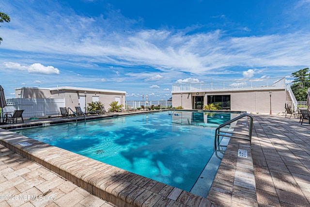 pool featuring fence