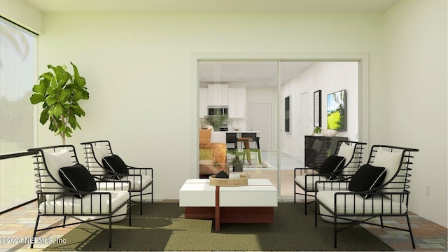 sitting room with brick floor