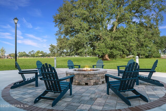 view of patio / terrace with a fire pit