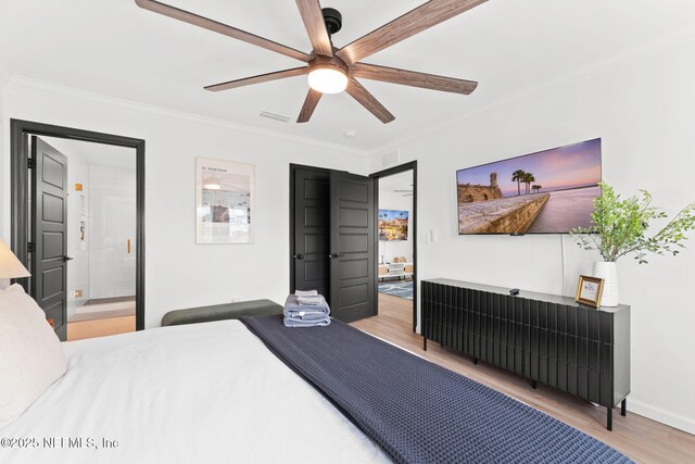 bedroom featuring a ceiling fan, baseboards, crown molding, and wood finished floors