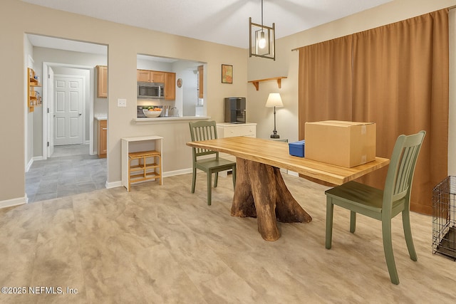 2277 Stauffer Rd, Green Cove Springs, FL 32043 - dining space featuring light carpet and baseboards