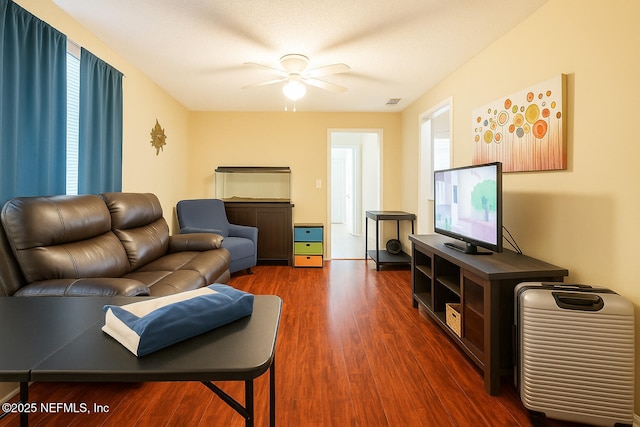 2277 Stauffer Rd, Green Cove Springs, FL 32043 - living area with dark wood finished floors and a ceiling fan