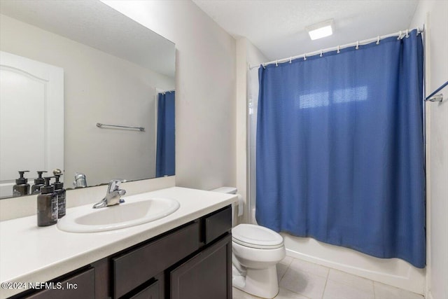 full bath with shower / bath combination with curtain, toilet, a textured ceiling, vanity, and tile patterned floors