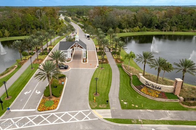 bird's eye view featuring a water view and a view of trees