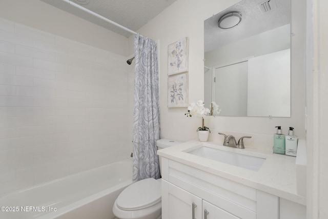 full bathroom featuring toilet, shower / bathtub combination with curtain, a textured ceiling, and vanity