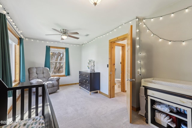 carpeted bedroom with visible vents and baseboards