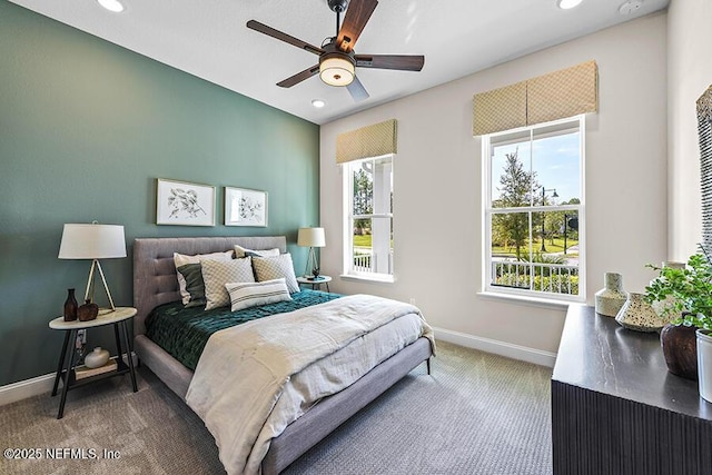 carpeted bedroom with ceiling fan, recessed lighting, and baseboards